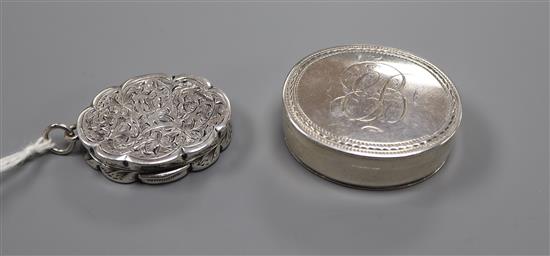 A George III silver oval vinaigrette, Cornelius Bland, London, 1796, 35mm and a later Victorian silver vinaigrette, 31mm.